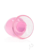 RealRock Crystal Clear Anal Plug 4.5 Inch Pink showcasing its see-through design and smooth texture for comfortable use.