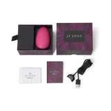 Je Joue Mimi Soft Rechargeable Silicone Clitoral Vibrator Fuchsia in elegant packaging with user manual and USB charger.