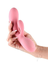 Lust-N-Dreams Samba Silicone Rabbit Vibrator Pink held in hand showing its elegant design and dual-stimulation features.