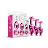 Nixie Metal Butt Plug Trainer Set 3 Piece Pink Metallic in a stylish package showcasing the plugs with jewel details.