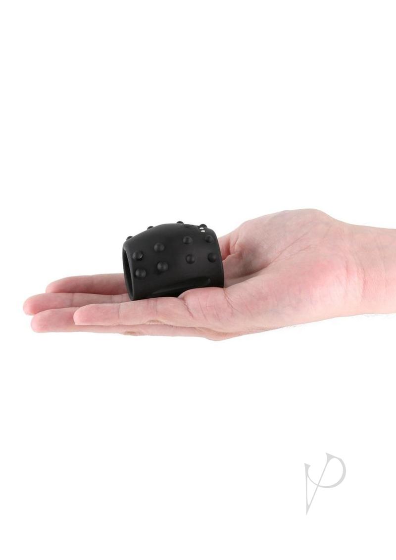 Renegade Sidekick Rechargeable Silicone Penis Sleeve Black held in hand, showcasing its comfort and design.