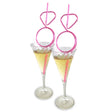 Glitterati Diamond Straw Set 8 Count with pink diamond-shaped straws in champagne glasses.