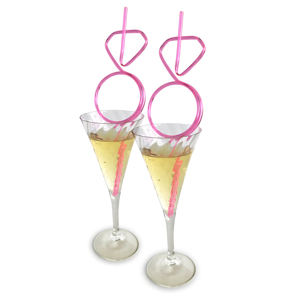 Glitterati Diamond Straw Set 8 Count with pink diamond-shaped straws in champagne glasses.