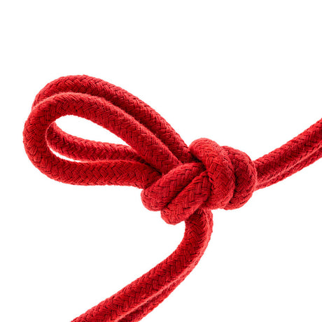 Blush Temptasia Bondage Rope 32ft Cotton Red tied in a secure knot for sensual restraint play.