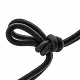 Temptasia 32 Foot Cotton Bondage Rope Black with a decorative knot, showcasing its smooth texture and design.