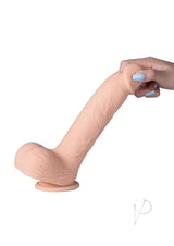 Kenzo App Controlled 9.5 Inch Thrusting Dildo Caramel held in hand against a white background.