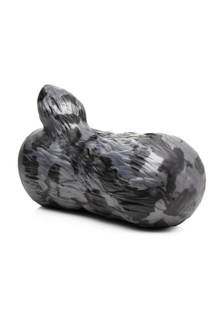 Creature Cocks She Wolf Silicone Stroker in black and silver wolf design, showcasing premium silicone material.