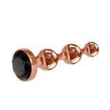 Gender X Gold Digger Large Metal Anal Plug with three beads and a black gem base.