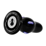 Rear Rocker Vibrating Glass Anal Plug with smooth black borosilicate glass and control button.