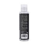 Back view of Drenched Warmth 4 Oz Water Based Lubricant bottle with usage instructions.