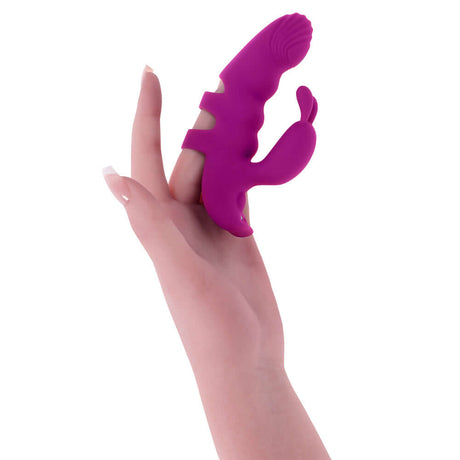 Playboy Pleasure Lend A Hand Finger Vibrator shown on a hand, highlighting its ergonomic design and functionality.