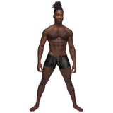 Male Power Poseidon Studded Chaps Black S M worn by a model showcasing bold, fetish style with decorative studs.