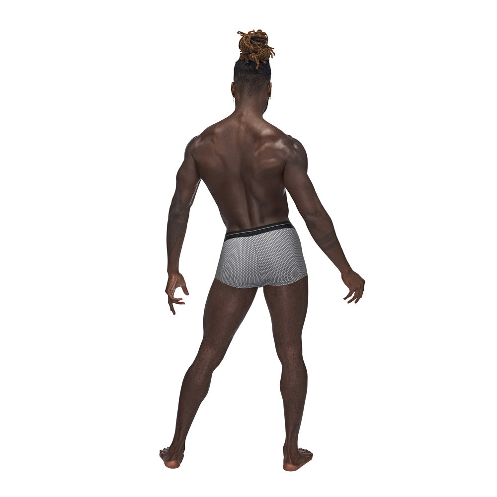 Model showcasing the Sexagon Mini Short Grey Medium from the back, highlighting its modern design and comfortable fit.