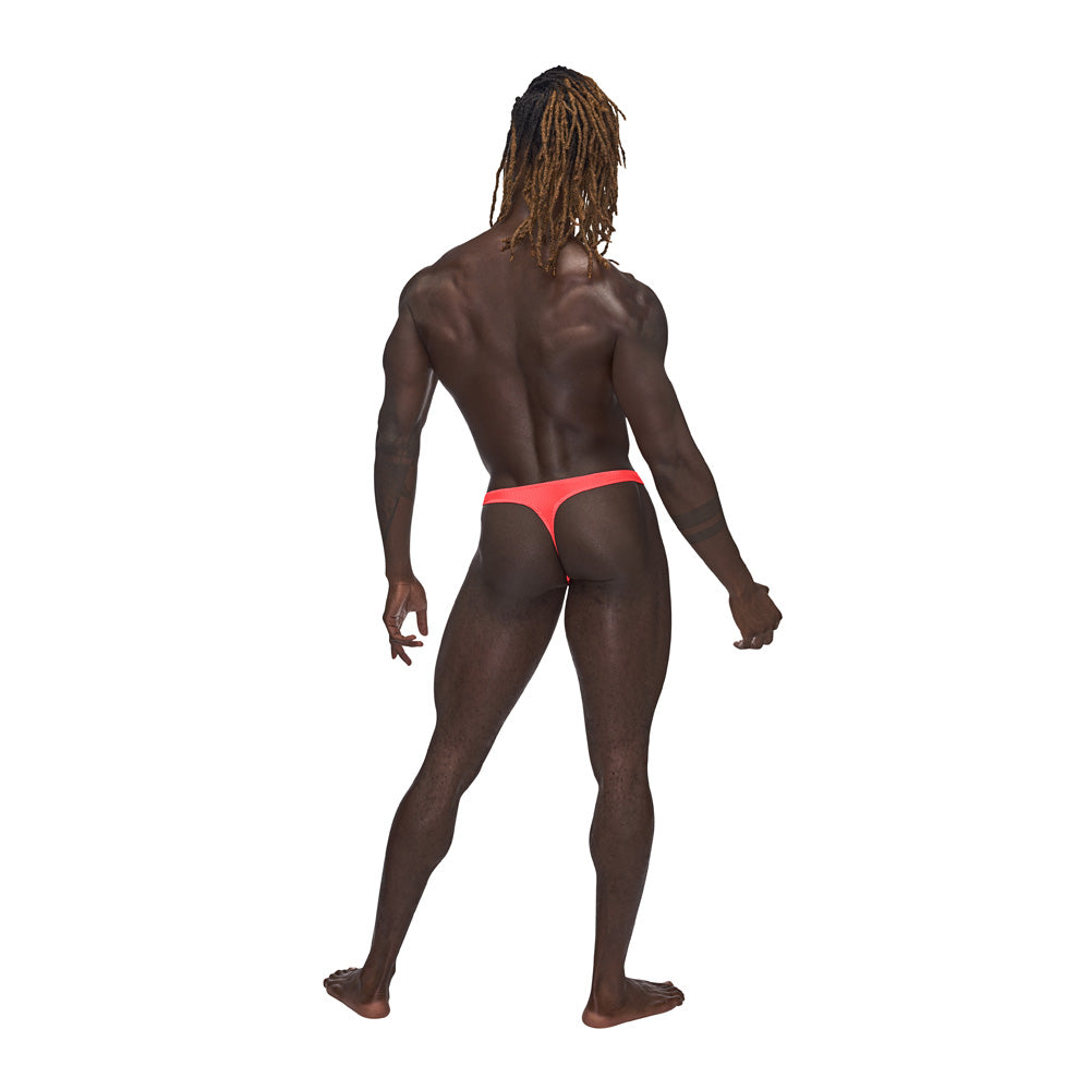 Model showcasing Barely There Bong Thong Coral S M from the back to highlight its flattering fit and design.