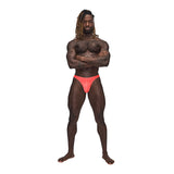 Barely There Bong Thong Coral S M on a muscular model, showcasing confidence and a flattering fit.