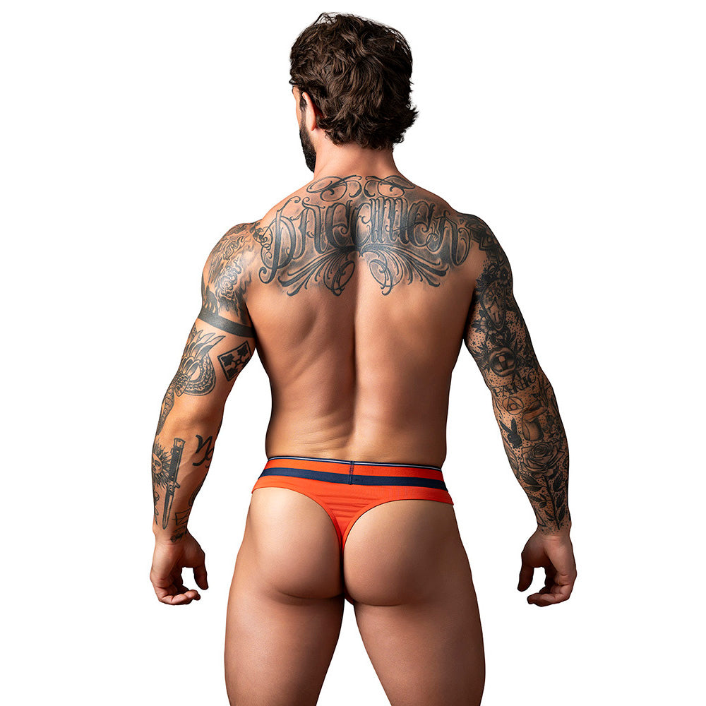 Male Power Soo Cumfy Thong Orange Small Medium worn by a tattooed man from the back, showcasing its low rise design.
