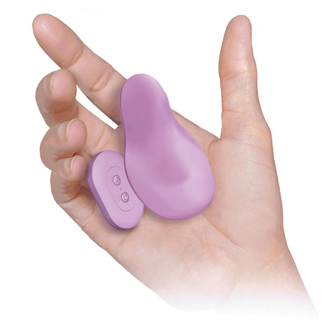 Ultra Panty Vibe Here Kitty Kitty Purple held in a hand with remote, showcasing its compact design and powerful stimulation features.