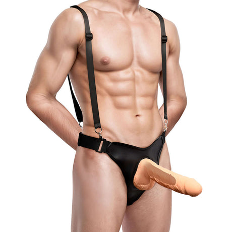 Master Series Magnum 9 inch Hollow Silicone Dildo & Harness on muscular model showcasing fit and design.