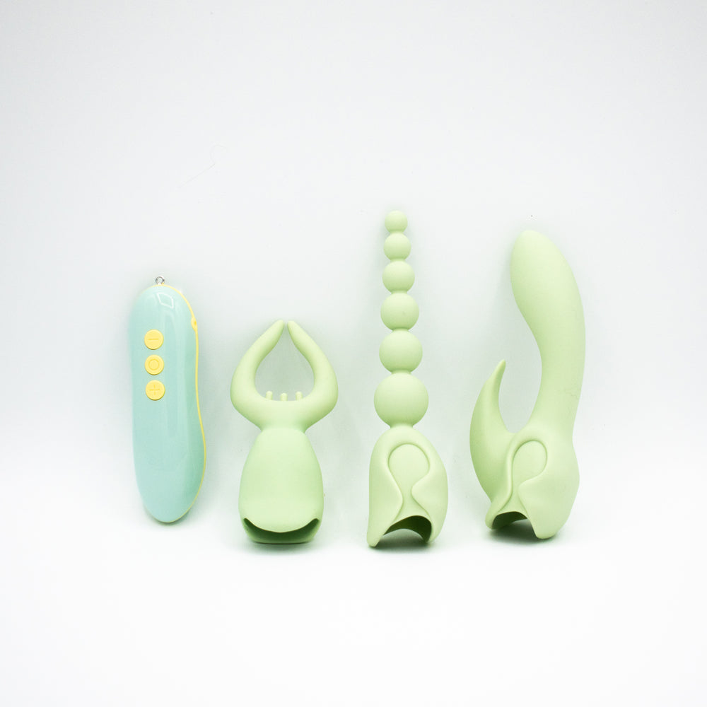 Pleasure Hunter Multifunction Vibrator Kit Mint with interchangeable attachments displayed in green.