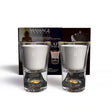 Neo Sensual Celebrate Duo Massage Candles 1 oz in elegant glass holders with gold leaf flakes and packaging.