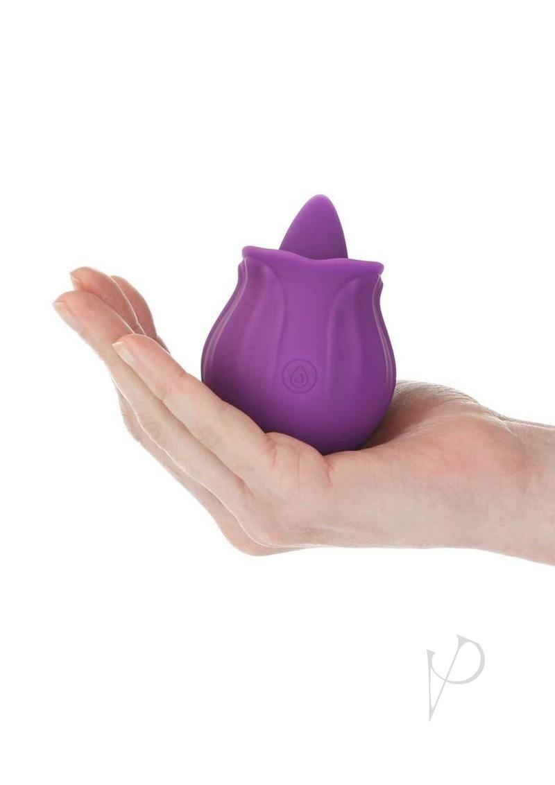 M'Lady Flickering Tongue Clitoral Stimulator Purple held in hand, showcasing its petite rose-shaped design.