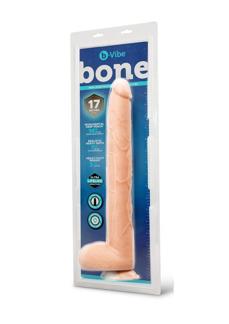 B-Vibe Bone Dildo with Balls & Suction Cup 17 inch Beige in packaging, showcasing its realistic design and length.