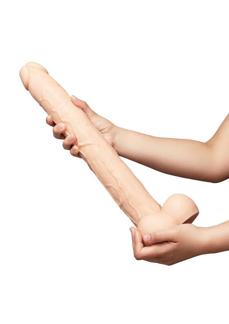 B-Vibe Bone Dildo with Balls & Suction Cup 17 inch Beige held in hands showing realistic details and length.