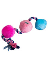 Scruffy Tug Buttons Pink Blue plush dog toy with pink and blue balls and rope for tugging and fetching.