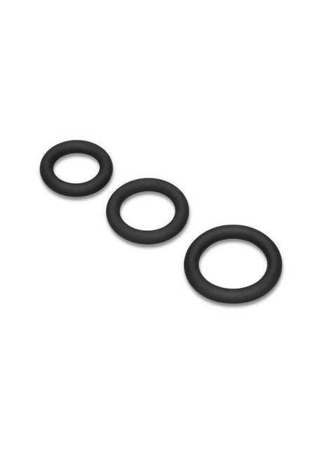 B-Vibe Snug Ring Thick Silicone Cock Ring 3 Pack Black featuring three black silicone rings for enhanced performance.