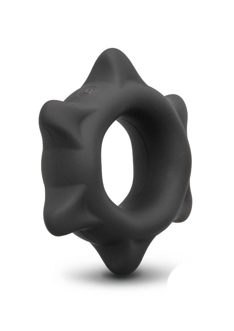 B-Vibe Flex Ring Spike Silicone Cock Ring Black on a white background, showcasing its unique design and texture.