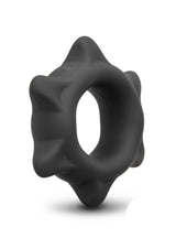 B-Vibe Flex Ring Spike Silicone Cock Ring Black on a white background, showcasing its unique design and texture.
