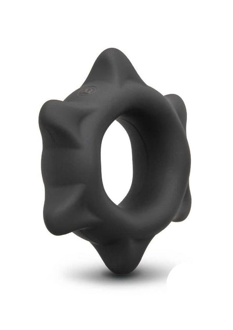 B-Vibe Flex Ring Spike Silicone Cock Ring Black on a white background, showcasing its unique design and texture.