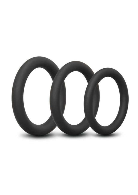 B-Vibe Snug Ring Lite Silicone Cock Ring 3 Pack Black showcasing three durable and comfortable black silicone rings.