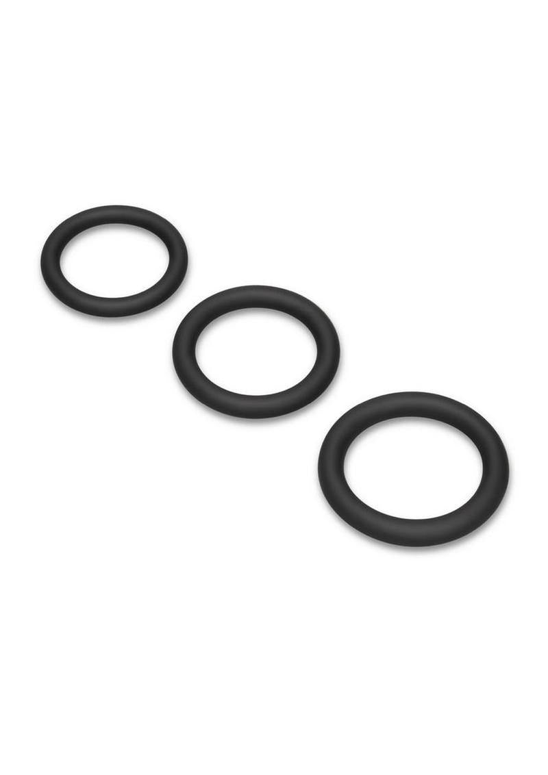 B-Vibe Snug Ring Lite Silicone Cock Ring 3 Pack Black shown in three durable rings with a seamless finish.