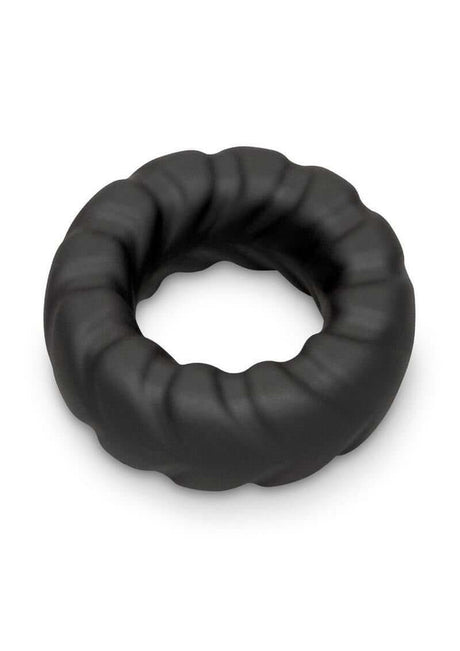 B-Vibe Flex Ring Tread Silicone Cock Ring Black on a white background showcasing its textured design.