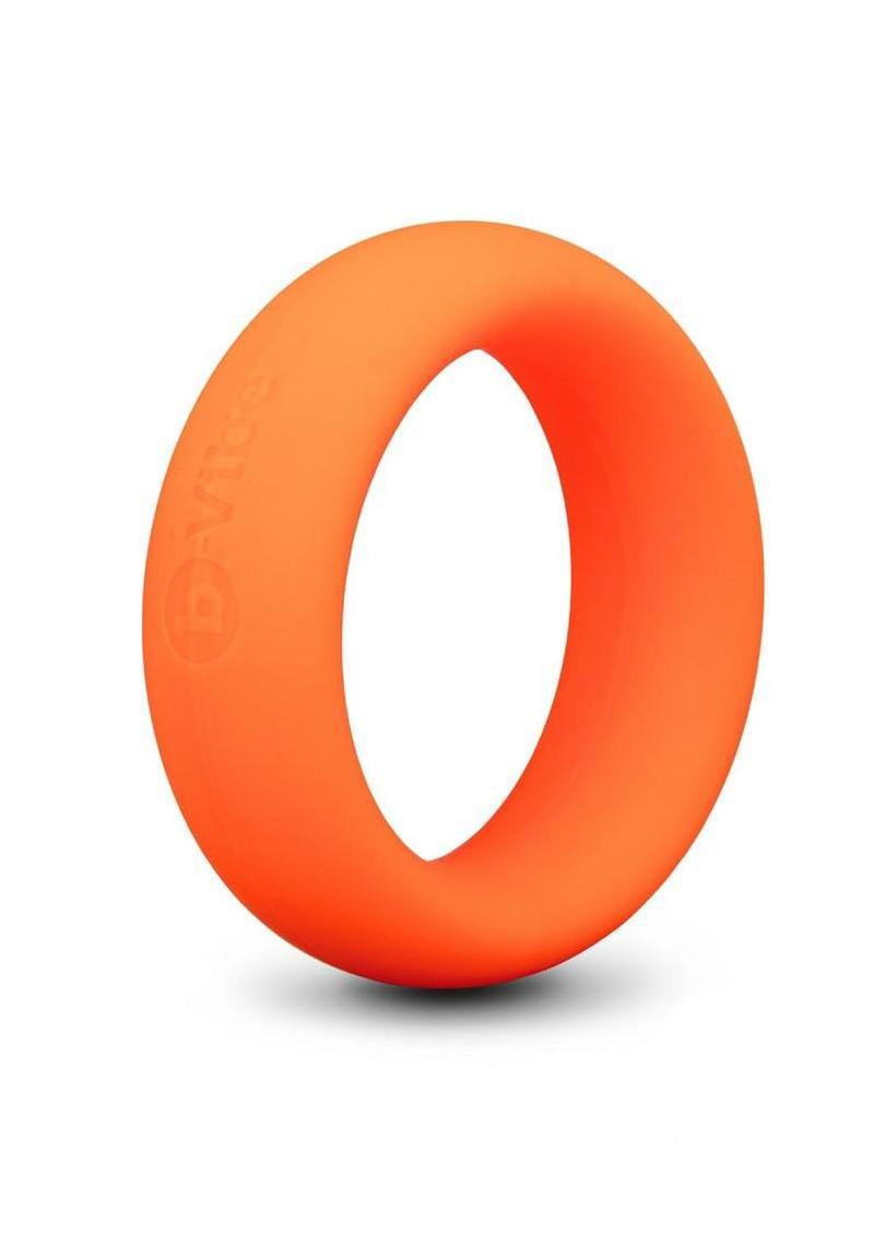 B-Vibe Snug Ring Silicone Cock Ring 40 mm Orange showcasing its skin-like comfort and smooth finish.