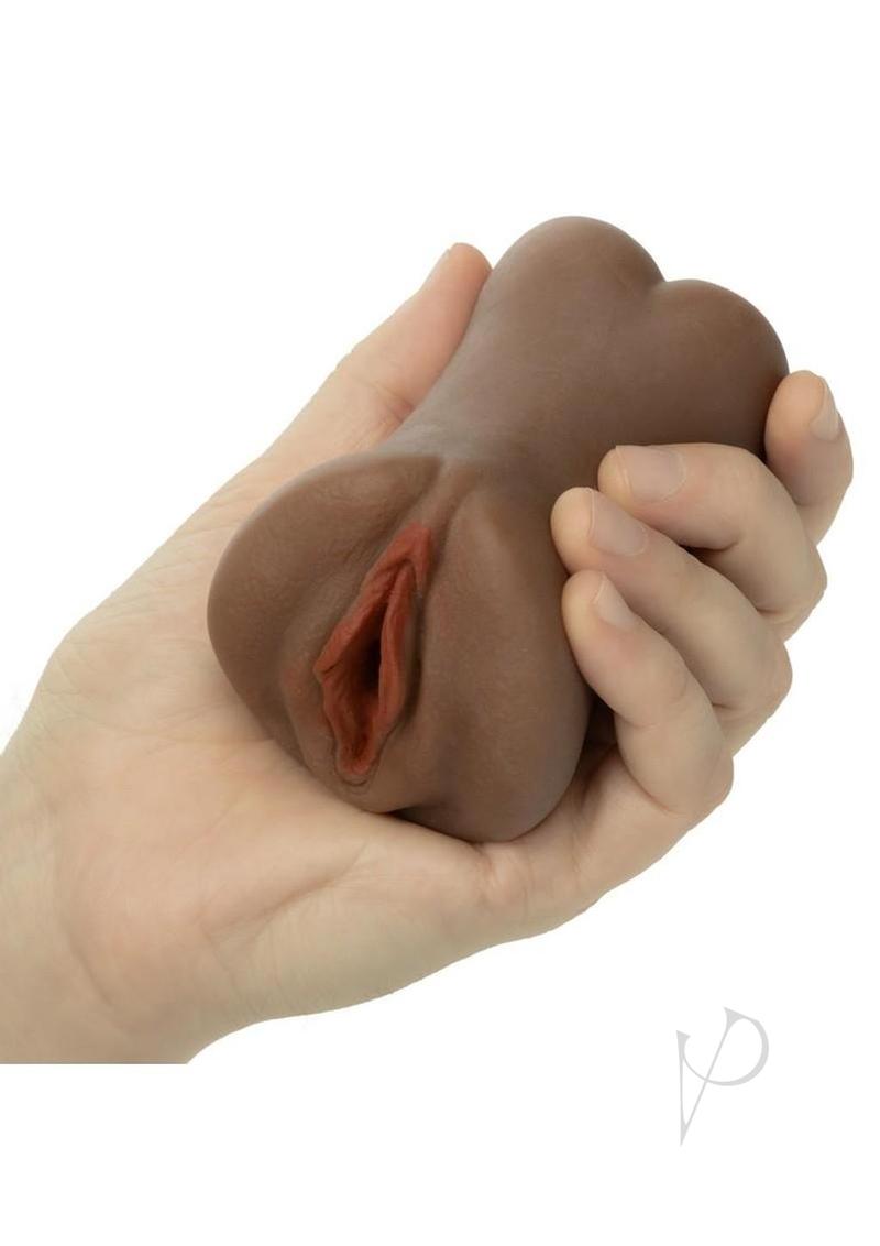 Cheap Thrills Cherry Poppers Teacher's Pet Stroker Caramel in hand for realistic pleasure and sensation.