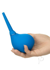 Water Systems One-Way Silicone Anal Douche Blue held in hand showcasing its ergonomic design.