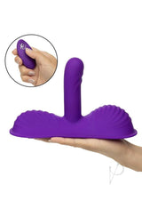 Triple Rider Silicone Remote Control Gyrating Rumbler Purple in hand, demonstrating its features and remote style.