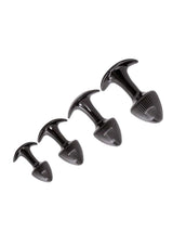 Walk Around Trainer Plugs 4 Pack Black featuring four tapered black anal training plugs for comfortable exploration.