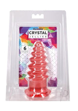 Crystal Jellies Anal Twist Plug 6 inches Pink packaging displayed on a colorful geometric background.