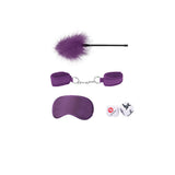 Ouch Introductory Bondage Kit No 2 Purple featuring restraints, feather tickler, and sensory elements.