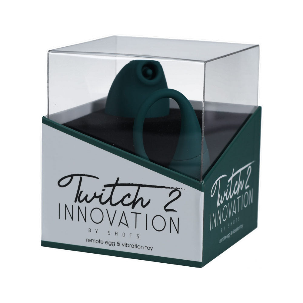 Twitch 2 Suction & Flapping Vibrator Forest Green packaging with remote egg & vibration toy.