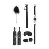 Ouch Beginners Bondage Kit Black with feather tickler, whip, ball gag, cuffs, and blindfold.