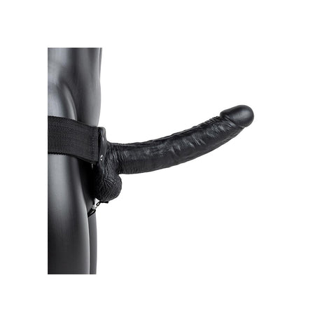 Realrock Hollow Strap-on With Balls 9 inch Black showing realistic design and strap-on harness on model.