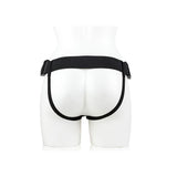 Realrock Hollow Strap-on Without Balls 10 inch Flesh harness on a mannequin from behind