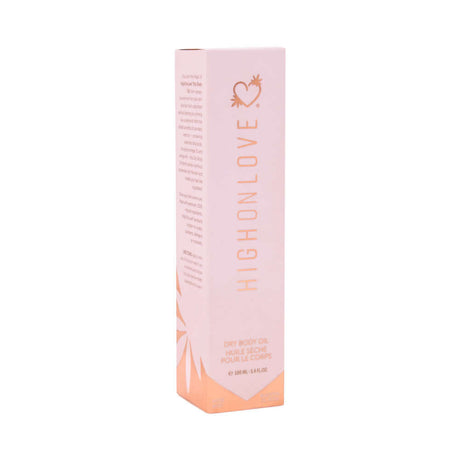 HighOnLove Dry Body Oil Spray packaging on a light pink box with branding and product details.