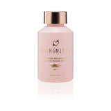 HighOnLove Objects of Luxury Gift Set Sensual Massage Oil in a pink bottle with gold cap.