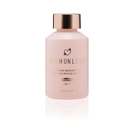 HighOnLove Objects of Luxury Gift Set Sensual Massage Oil in a pink bottle with gold cap.