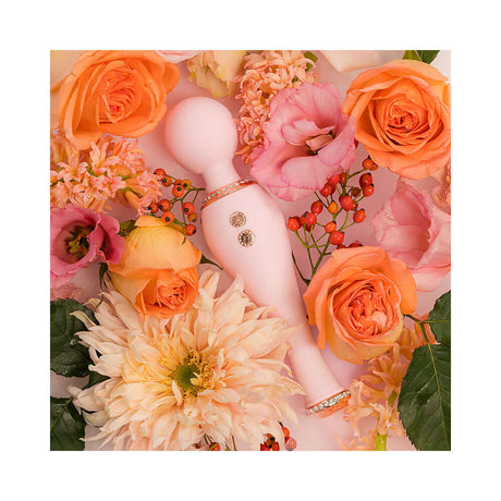 HighOnLove Objects of Luxury Gift Set featuring a bedazzled silicone body wand surrounded by vibrant flowers.